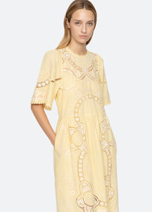 Elevate your wardrobe with the Vesna Embroidered Midi Dress by SEA NY, featuring delicate embroidery and scalloped trim for a refined finish. Its crew neckline and short sleeves complement the flattering A-line silhouette, while the hem gracefully falls below the knee. The back tie closure offers a tailored fit, combining elegance with comfort. Crafted from a cotton, linen, and polyester blend, this dress is best maintained with dry cleaning to preserve its quality. Perfect for sophisticated occasions.