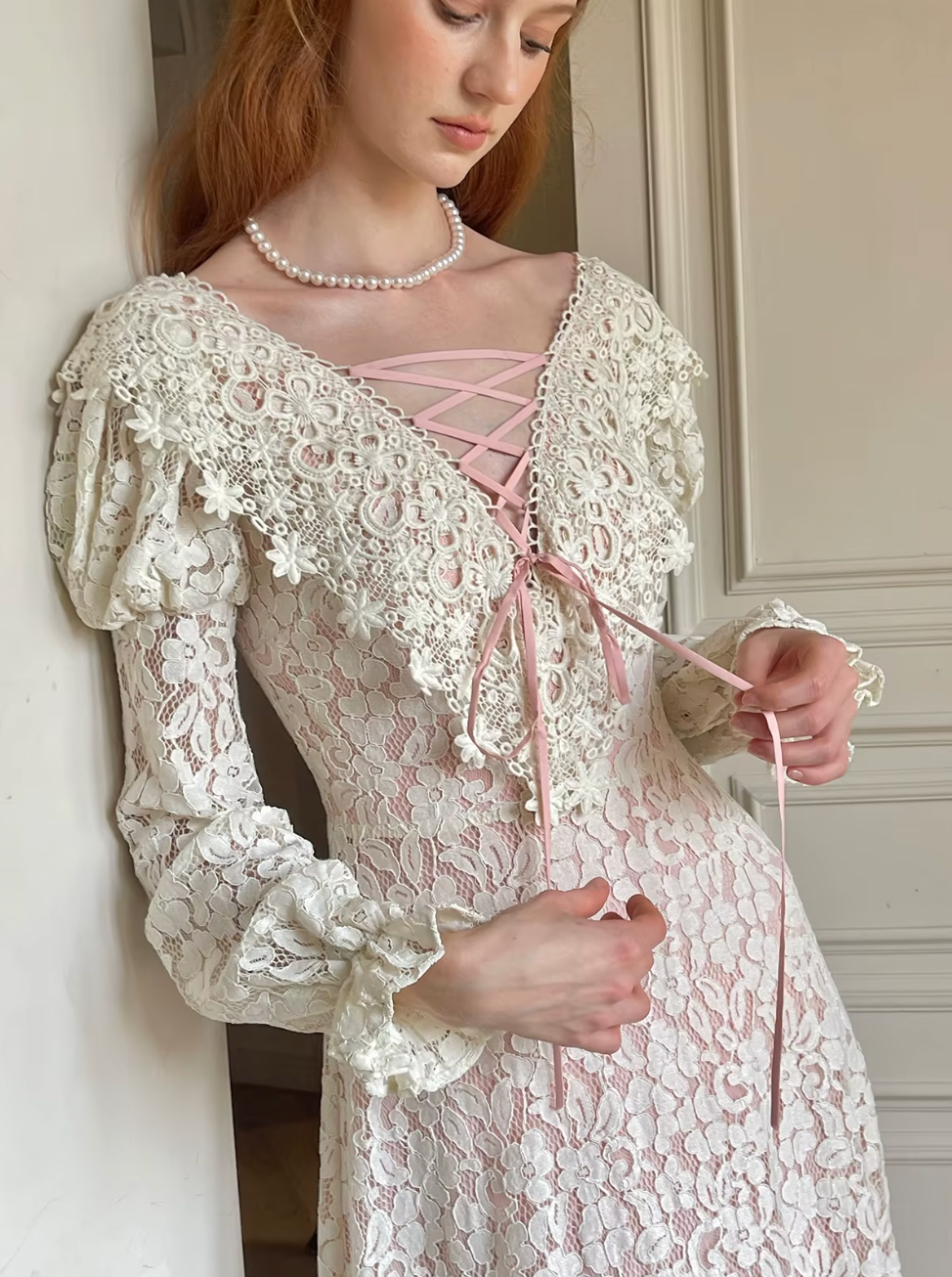 Unleash your vintage elegance in our Dahlia Dress! Perfect for spring and fall, this long dress features a slim and sexy silhouette with a flirty V-neck and charming long sleeves. Embrace French sweet luxury in this white lace dress, a must-have for any fashion-forward woman.