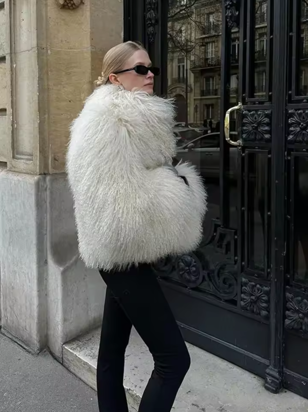 The Georgina Coat is a sophisticated winter essential crafted from thick, solid-color faux fur to provide exceptional warmth and style. Featuring a flattering round neck and long sleeves, this short jacket combines cozy comfort with high street elegance. Perfect for layering over any outfit, it promises durability and a polished look, making it a versatile choice for the colder months. 