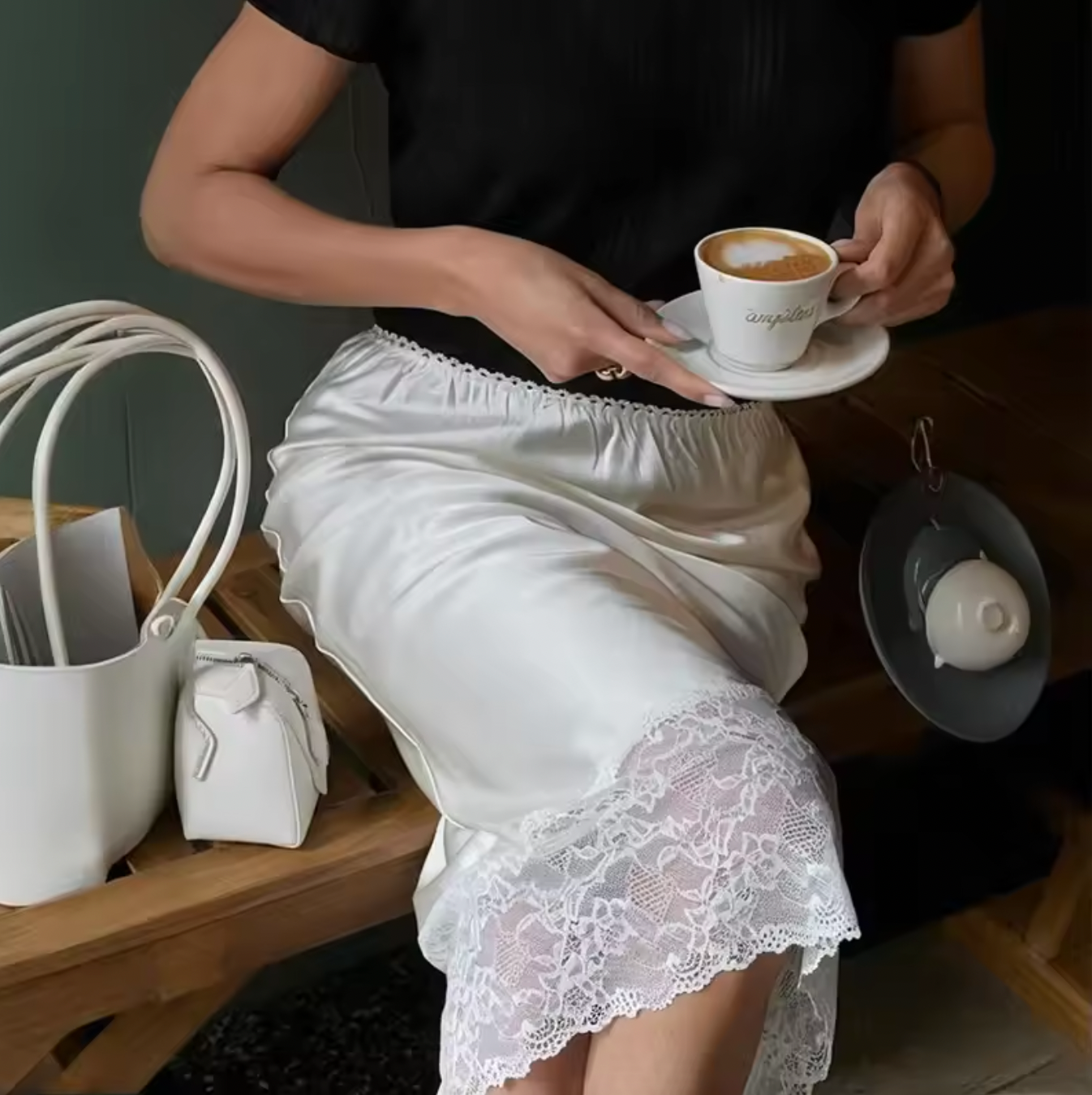 Elevate your wardrobe with the Margot Lace Skirt, an elegant satin piece designed for the modern professional woman. Featuring a high waist and graceful lace splice detail, this long skirt combines sophistication with comfort, ideal for summer wear. Its refined silhouette enhances your figure while maintaining a polished look suitable for any formal or business setting. The breathable satin fabric ensures all-day comfort, making it a versatile addition to your seasonal collection.