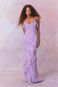 Designed with elegance and movement in mind, the Rialto Maxi Dress in Hibiscus captivates with its chiffon fabric and cascading asymmetrical ruffles that flow from neckline to hem. Its slightly fitted silhouette enhances your figure with subtle allure, while a discreet side seam zipper ensures a seamless fit. Perfect for dancing or any refined occasion, this dress combines comfort with sophisticated style effortlessly.