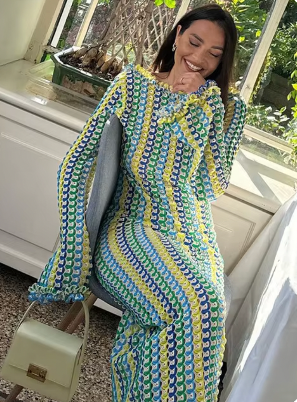 The Isla Maxi Dress is the perfect addition to your summer wardrobe. Crafted with a crochet knit and a stylish open back, this dress offers a fitted silhouette and bell sleeves for a trendy look. Ideal for beach vacations, it's a must-have for any fashion-forward woman.