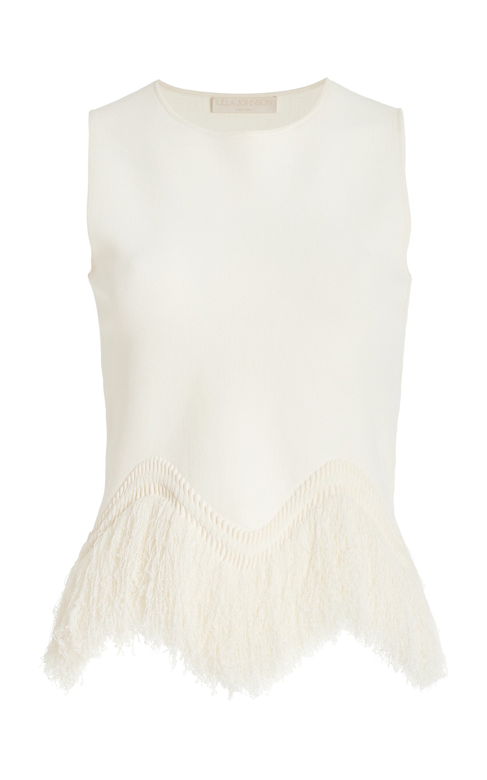 The 'Paulina' skirt offers a graceful A-line shape that gently widens toward its distinctive zig-zag fringe-trimmed hem. Complete the look by pairing it with the coordinating 'Koa' top, which boasts a sleek, sleeveless design accented by a matching zig-zag fringe detail at the hem.