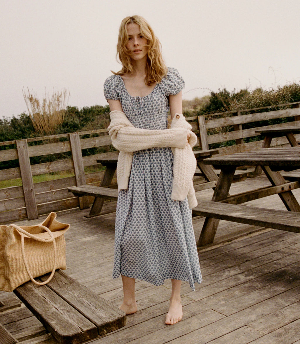 Crafted from 100% organic cotton poplin, the Quinn Dress in Dahlia Ditsy offers refined comfort with a scoop neckline accented by an adjustable tie and an elegant keyhole detail, creating a graceful silhouette perfect for any occasion.