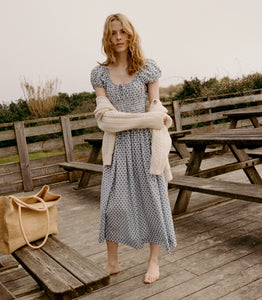 Crafted from 100% organic cotton poplin, the Quinn Dress in Dahlia Ditsy offers refined comfort with a scoop neckline accented by an adjustable tie and an elegant keyhole detail, creating a graceful silhouette perfect for any occasion.