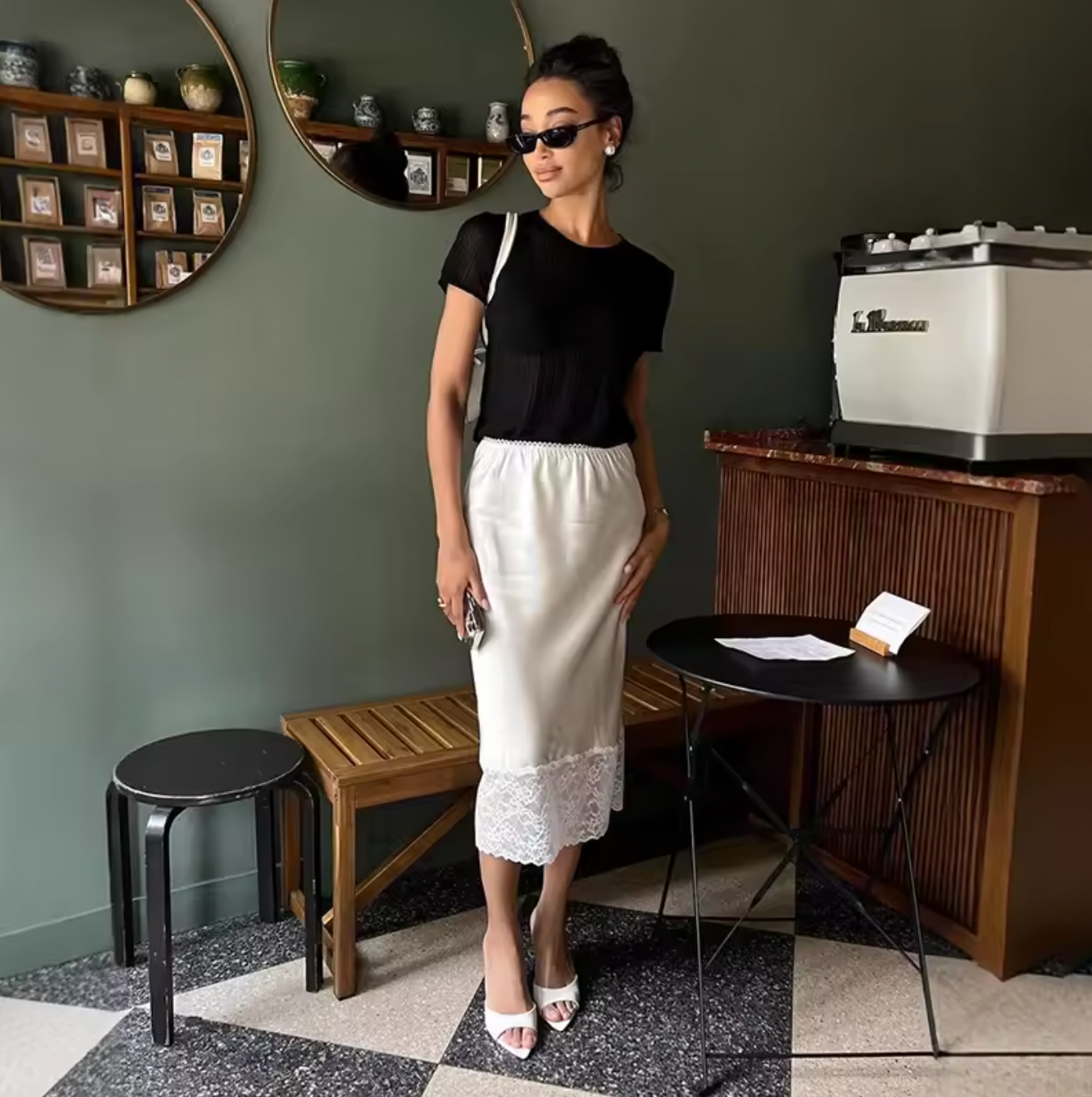 Elevate your wardrobe with the Margot Lace Skirt, an elegant satin piece designed for the modern professional woman. Featuring a high waist and graceful lace splice detail, this long skirt combines sophistication with comfort, ideal for summer wear. Its refined silhouette enhances your figure while maintaining a polished look suitable for any formal or business setting. The breathable satin fabric ensures all-day comfort, making it a versatile addition to your seasonal collection.