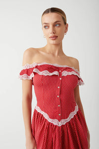 Elevate your evening look with the Charli Mini Dress in Scarlet Dot by Frankies Bikinis. Made of silk-like fabric, this off-the-shoulder dress features a smocked back and corset waist for a sultry silhouette. Vintage-inspired lace accents and lace trim add a touch of elegance, while the elastic neckline ensures a comfortable fit. Perfect for any special occasion.