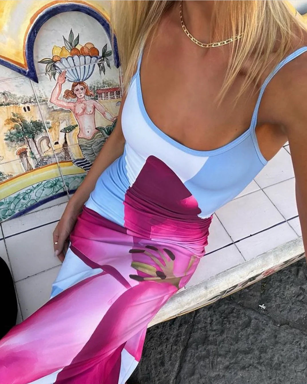 Experience the epitome of luxe Resort Wear with the Sky Lily Floral Slip Dress! Featuring a statement fuchsia Lily on a contrasting pale blue background, this fully lined dress accentuates the waistline and flatters the silhouette. Make a lasting impression in this stunning piece.