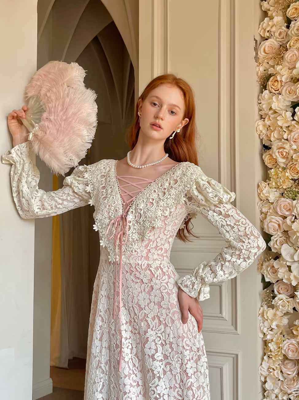Unleash your vintage elegance in our Dahlia Dress! Perfect for spring and fall, this long dress features a slim and sexy silhouette with a flirty V-neck and charming long sleeves. Embrace French sweet luxury in this white lace dress, a must-have for any fashion-forward woman.