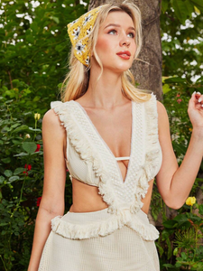 Get ready to make a statement at any beach or yacht event with PatBO's Camilla Beach Dress. Made from a lightweight cotton blend, this dress offers a comfortable and adjustable fit with its lace-up back ties. The silk fringe trims and flowy skirt add a touch of elegance, making it ideal for dancing all day long.