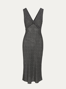 The Stephanie - Paradiso Noir is a silk dress designed for effortless elegance. Its adjustable back tie shapes the waist perfectly, while wide straps offer comfort and bra coverage. The V-neckline subtly enhances the décolletage, and its mid-calf length flatters a range of heights, revealing just the right amount of leg. Versatile for styling, it pairs beautifully with boots for a 90s-inspired look or delicate heels for a more refined finish. A timeless piece that effortlessly elevates your wardrobe.