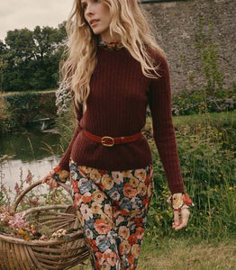 Crafted from washed silk crepe de chine, the Musetta Dress in Poppy Meadow by Doen combines elegance with refined tailoring. It features a sophisticated mock neck and dramatic flared sleeves finished with delicate ruffle trims at the cuffs. The fitted bodice, enhanced by an invisible side zipper, seamlessly flows into an ankle-grazing bias-cut skirt, ensuring a flattering silhouette and graceful movement. Ideal for those seeking timeless style with subtle, expert detailing.