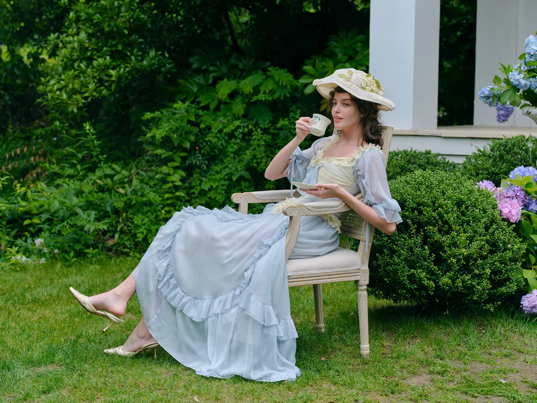 Introducing the Elora Dress - a vintage-inspired, slimming maxi dress in a sophisticated fishbone blue. With delicate lace accents and a seductive V-neck, this dress is perfect for summer parties and birthdays. Channel elegance and sexiness with every step in this exclusive piece.