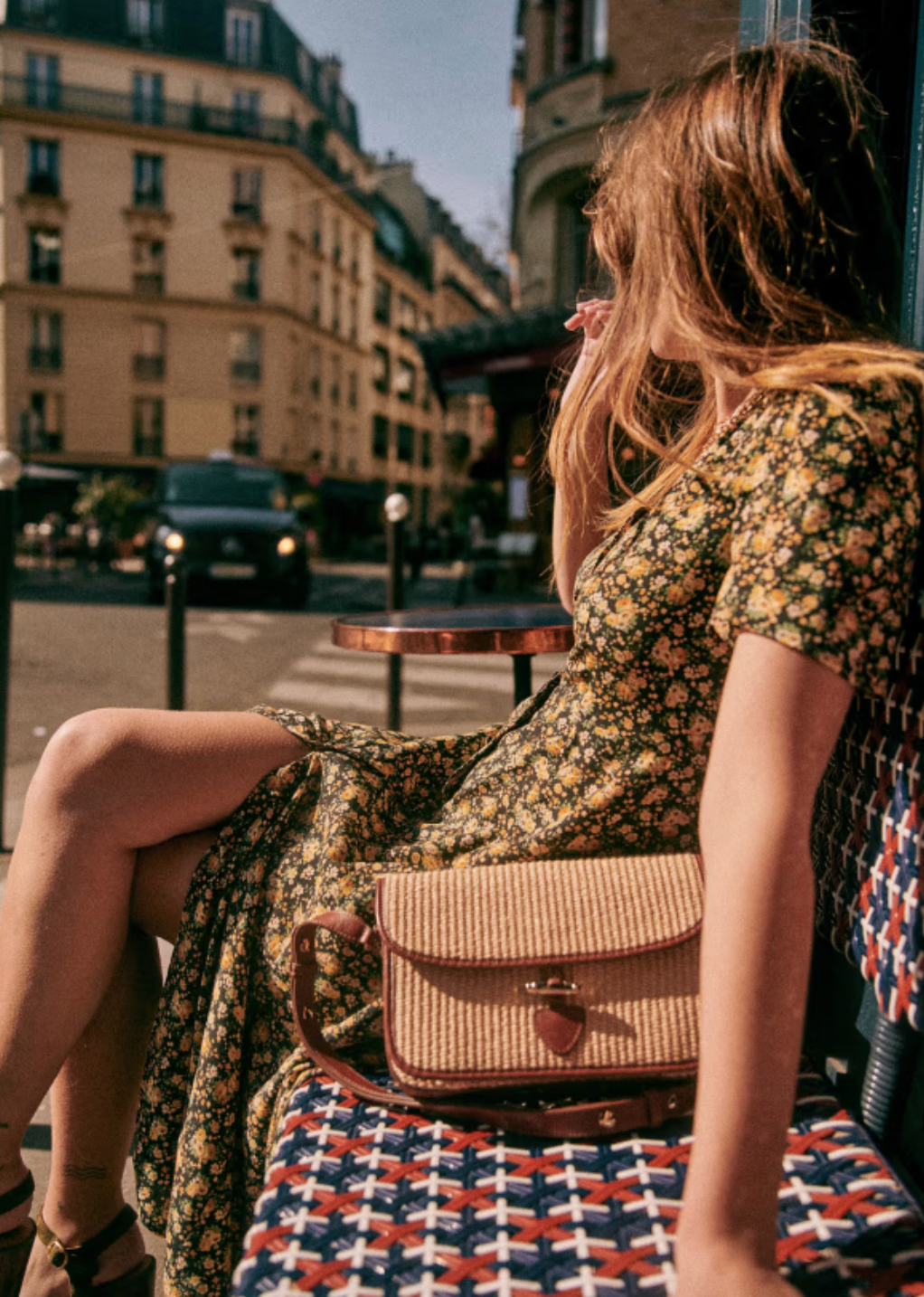 The Vivienne Dress by Sezane offers a graceful midi length silhouette with elegant short sleeves and a refined V neckline. Its button placket features covered buttons, adding a subtle yet polished touch. Fully lined for comfort and quality, this dress embodies sophisticated charm ideal for both formal and special occasions.