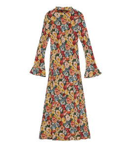 Crafted from washed silk crepe de chine, the Musetta Dress in Poppy Meadow by Doen combines elegance with refined tailoring. It features a sophisticated mock neck and dramatic flared sleeves finished with delicate ruffle trims at the cuffs. The fitted bodice, enhanced by an invisible side zipper, seamlessly flows into an ankle-grazing bias-cut skirt, ensuring a flattering silhouette and graceful movement. Ideal for those seeking timeless style with subtle, expert detailing.