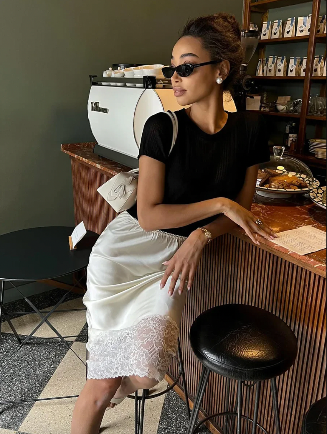 Elevate your wardrobe with the Margot Lace Skirt, an elegant satin piece designed for the modern professional woman. Featuring a high waist and graceful lace splice detail, this long skirt combines sophistication with comfort, ideal for summer wear. Its refined silhouette enhances your figure while maintaining a polished look suitable for any formal or business setting. The breathable satin fabric ensures all-day comfort, making it a versatile addition to your seasonal collection.