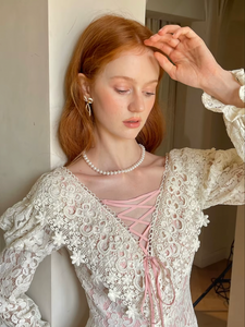 Unleash your vintage elegance in our Dahlia Dress! Perfect for spring and fall, this long dress features a slim and sexy silhouette with a flirty V-neck and charming long sleeves. Embrace French sweet luxury in this white lace dress, a must-have for any fashion-forward woman.