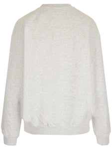 Elevate your casual wardrobe with the vintage-inspired Crewneck Sweatshirt! by Sporty & Rich Made from lightweight cotton, this loose-fitting sweatshirt features a unique round neck print and long sleeves. Perfect for a relaxed yet stylish look during the autumn season.