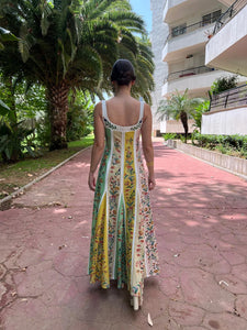 This sophisticated maxi dress from Farm Rio combines a linen-blend fabric with a delicate floral print and striking striped color-block panels. Featuring a flattering sweetheart neckline with a balconette-style bust, it offers an elegant silhouette. The concealed hook and zip fastening at the back ensures a seamless fit. Made from 55% linen and 45% viscose, this dress provides breathable comfort and graceful movement ideal for refined daytime or evening occasions.