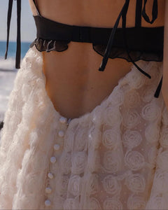 The Poppy Mini Dress from For Love & Lemons exudes luxury and sophistication with its 3D rose flock dot fabric and contrast satin cups. Underwire provides support while chiffon ruffled straps add a touch of femininity. The sheer skirt and keyhole back add allure, while the S-hook and invisible zip closures ensure a perfect fit. Fully lined for added comfort.