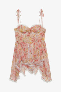 Elevate your summer wardrobe with the Elea Mini Dress, a delicate blend of romance and sophistication. This peach floral mini dress features structured underwire cups and a boned bodice for refined support and shape. Its multi-layered asymmetrical skirt gathers gracefully, ending with lace ruffles that add a subtle touch of elegance. Perfect for warm days and special occasions, the Elea Mini Dress offers a flattering silhouette that embodies effortless femininity.