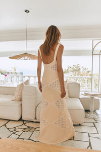 The Eliana Knit Maxi Dress features a distinctive two toned knit technique, adding depth and texture to the fabric. The result is a stylish and elegant dress that is both unique and versatile. The knit design also offers a subtle sheer effect, adding a touch of allure to the overall look. Elevate your wardrobe with this luxurious and sophisticated maxi dress.