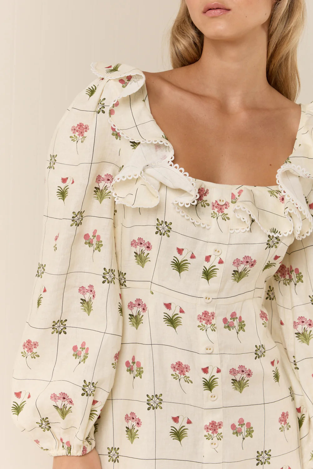 The Montana Dress in our exclusive Flower Ceramics print is expertly crafted from premium linen, combining comfort with refined style. It features a fitted bust and waist that enhance your silhouette, flowing into an elegant A-line skirt. The design includes subtle mock center-front button detailing, full-length sleeves, and a carefully tailored square neckline for a sophisticated finish. Consult our size and fit guide to ensure the perfect fit tailored to your measurements.