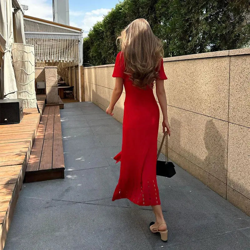 Effortlessly elegant and chic, the Mathilde Midi Dress is a must-have for any fashion-forward woman. Its contrast single breasted design, knitted fabric, and delicate hollow out details make this dress a statement piece. Embrace your feminine side with this high street dress that exudes confidence and sophistication.