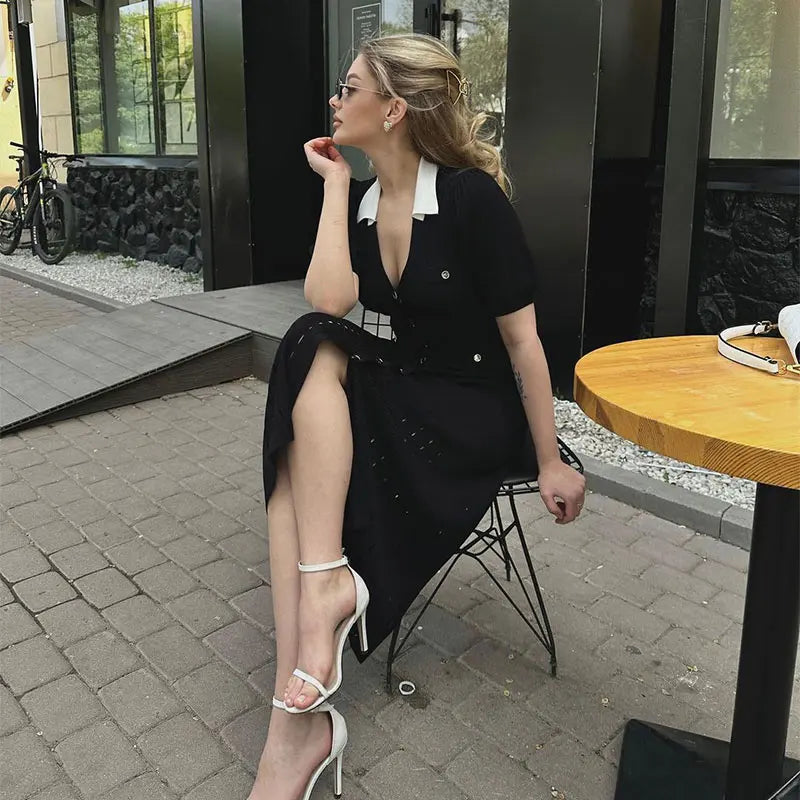 Effortlessly elegant and chic, the Mathilde Midi Dress is a must-have for any fashion-forward woman. Its contrast single breasted design, knitted fabric, and delicate hollow out details make this dress a statement piece. Embrace your feminine side with this high street dress that exudes confidence and sophistication.