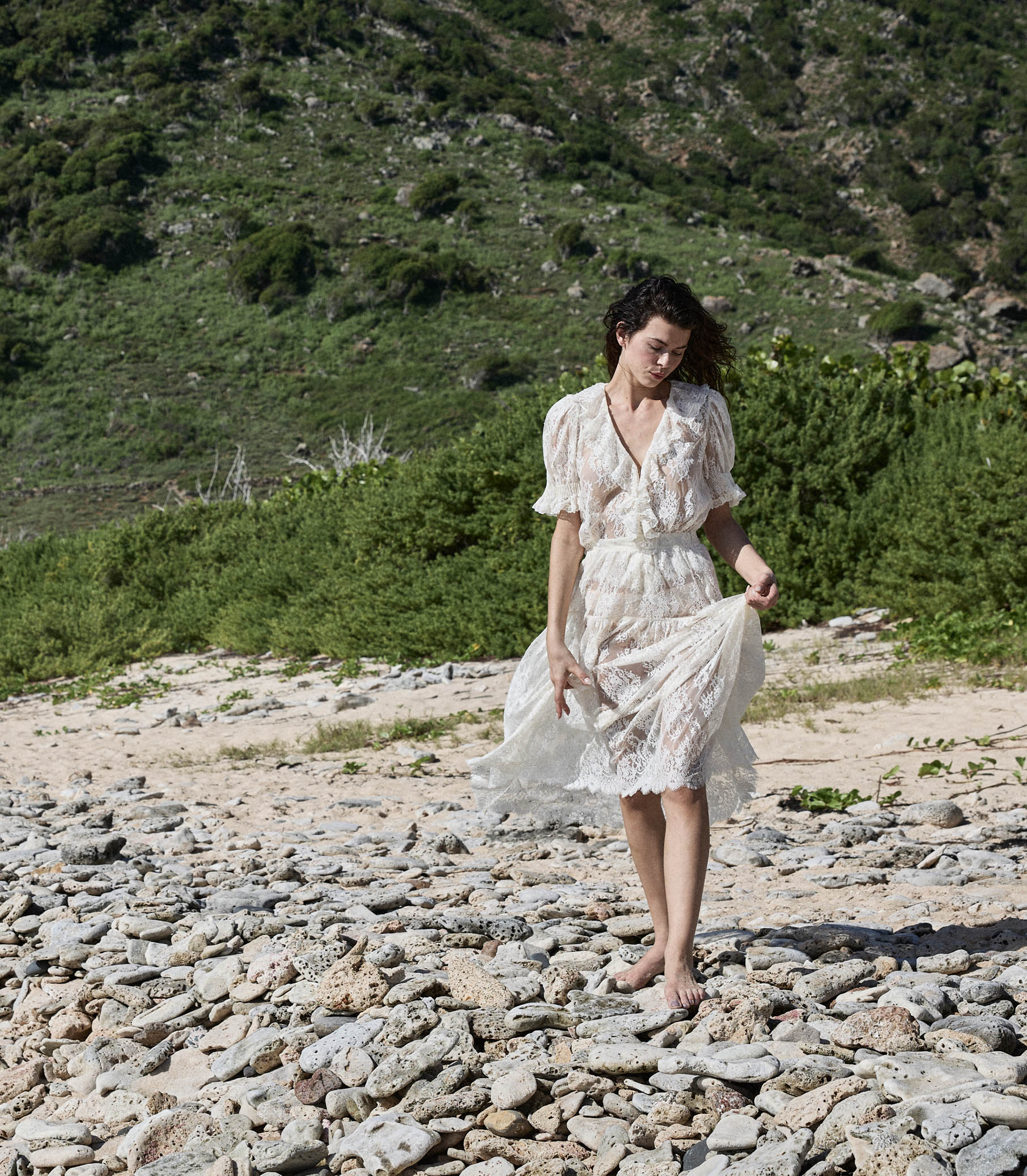 Crafted from delicate chantilly-inspired lace, the Sebastiane skirt by Doen embodies timeless elegance with its romantic silhouette. The high-waisted A-line cut flatters the figure while the scalloped hem adds refined detail, falling gracefully to mid-shin length. Unlined for a lightweight feel, this piece pairs beautifully with a slip for layering versatility. Perfect for those seeking sophisticated, vintage-inspired style with contemporary comfort.