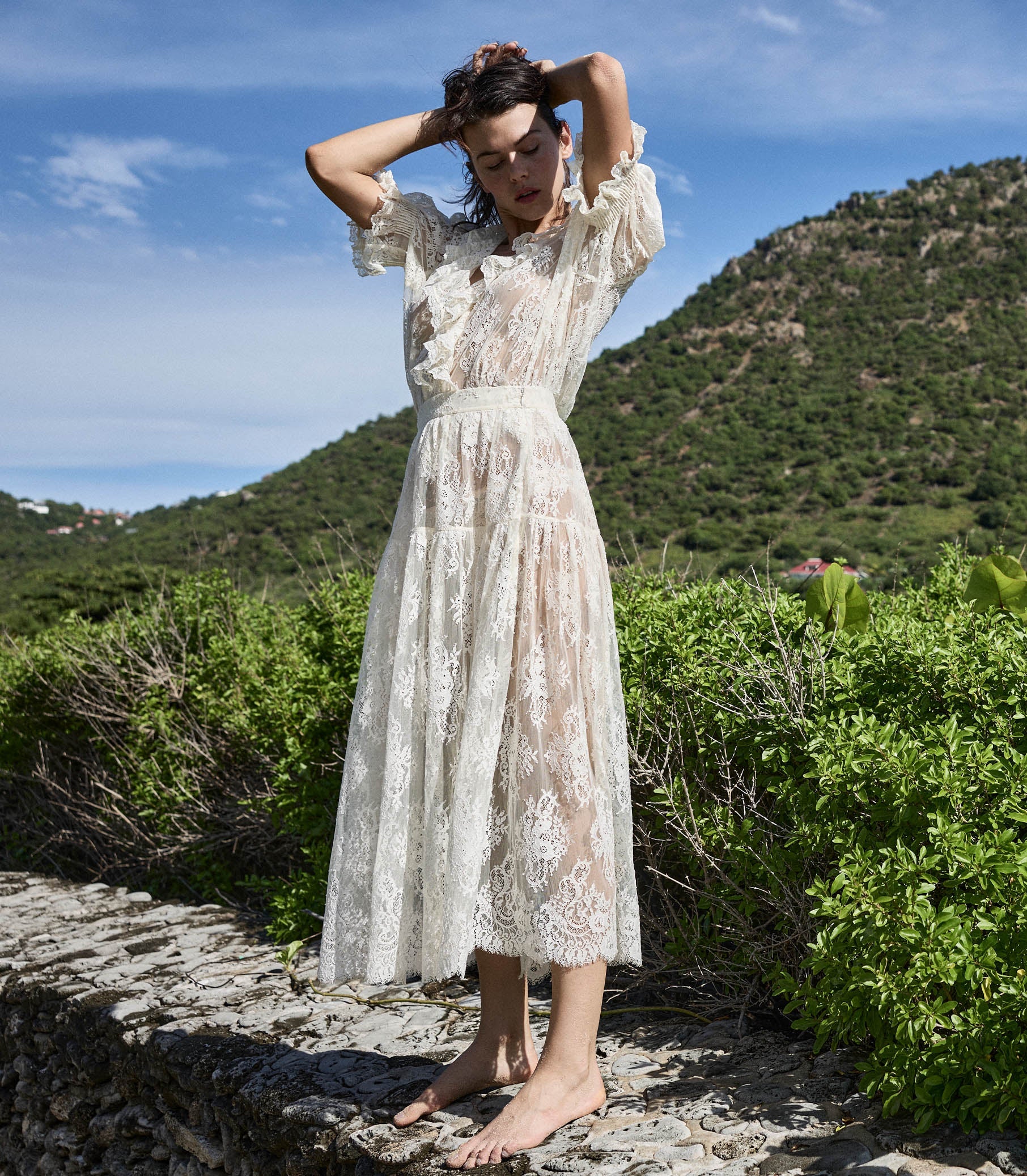 Crafted from delicate chantilly-inspired lace, the Sebastiane skirt by Doen embodies timeless elegance with its romantic silhouette. The high-waisted A-line cut flatters the figure while the scalloped hem adds refined detail, falling gracefully to mid-shin length. Unlined for a lightweight feel, this piece pairs beautifully with a slip for layering versatility. Perfect for those seeking sophisticated, vintage-inspired style with contemporary comfort.