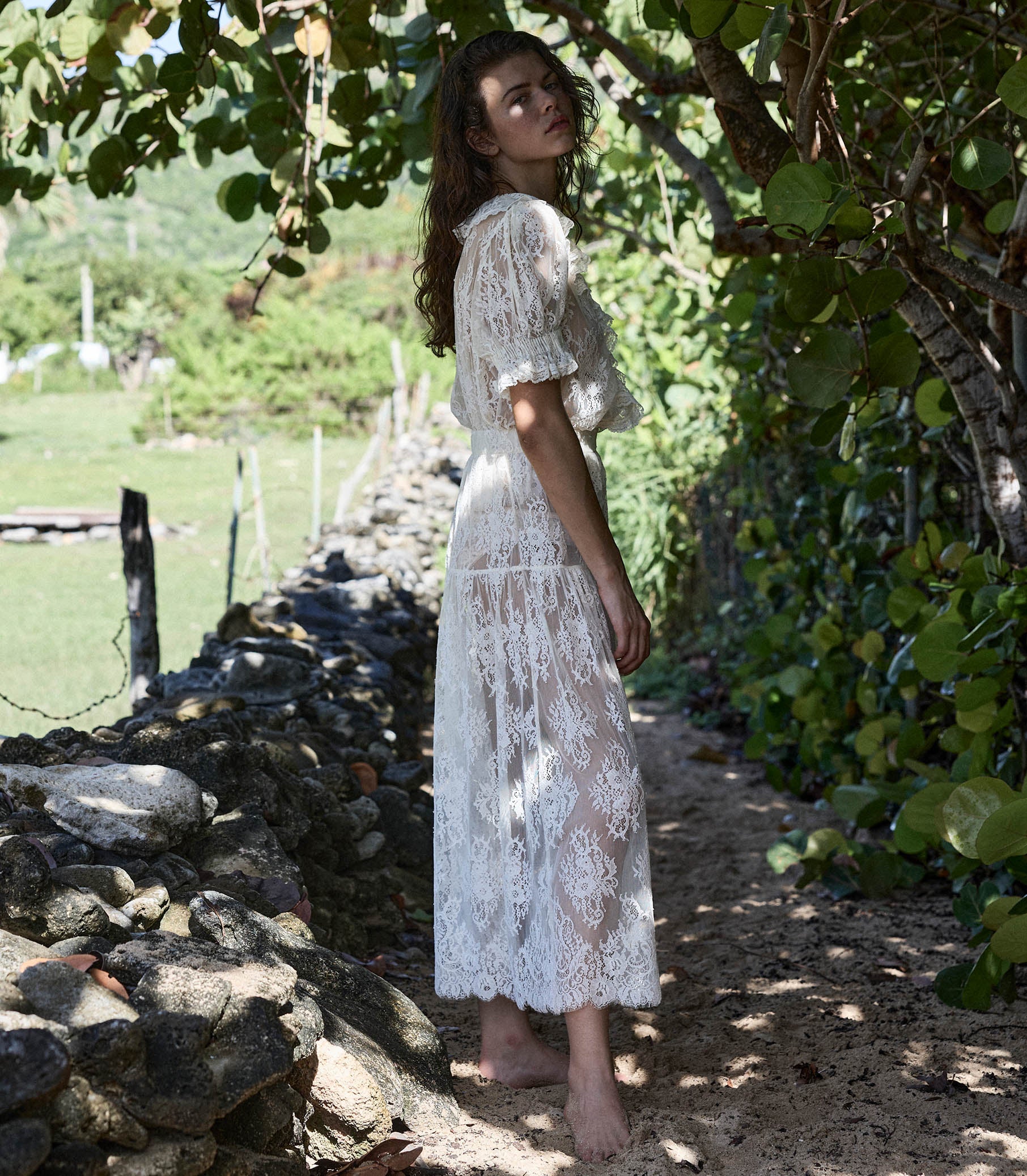 Crafted from delicate chantilly-inspired lace, the Sebastiane skirt by Doen embodies timeless elegance with its romantic silhouette. The high-waisted A-line cut flatters the figure while the scalloped hem adds refined detail, falling gracefully to mid-shin length. Unlined for a lightweight feel, this piece pairs beautifully with a slip for layering versatility. Perfect for those seeking sophisticated, vintage-inspired style with contemporary comfort.