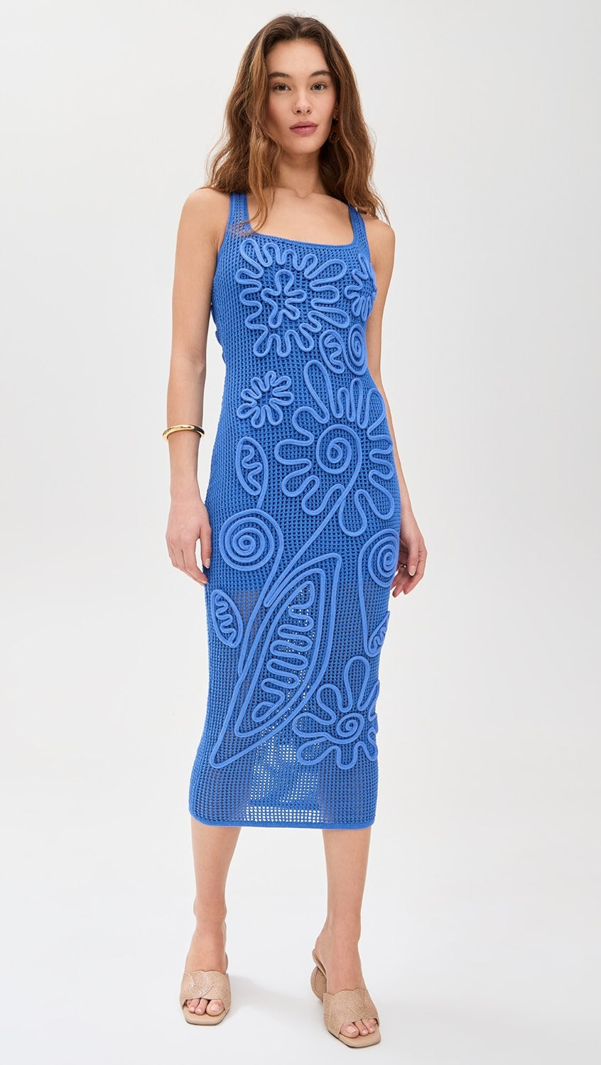 Crafted from mid-weight stretch crochet, the Nissa Knit Dress by Cult Gaia offers a comfortable fit with subtle elasticity. Its corded floral detailing adds refined texture and visual interest, while the midi length delivers elegant coverage. Featuring a square neckline and a seamless pullover design, this dress combines effortless wearability with sophisticated styling. Ideal for those seeking a balance of structure and flexibility in a distinctive, expert-crafted piece.