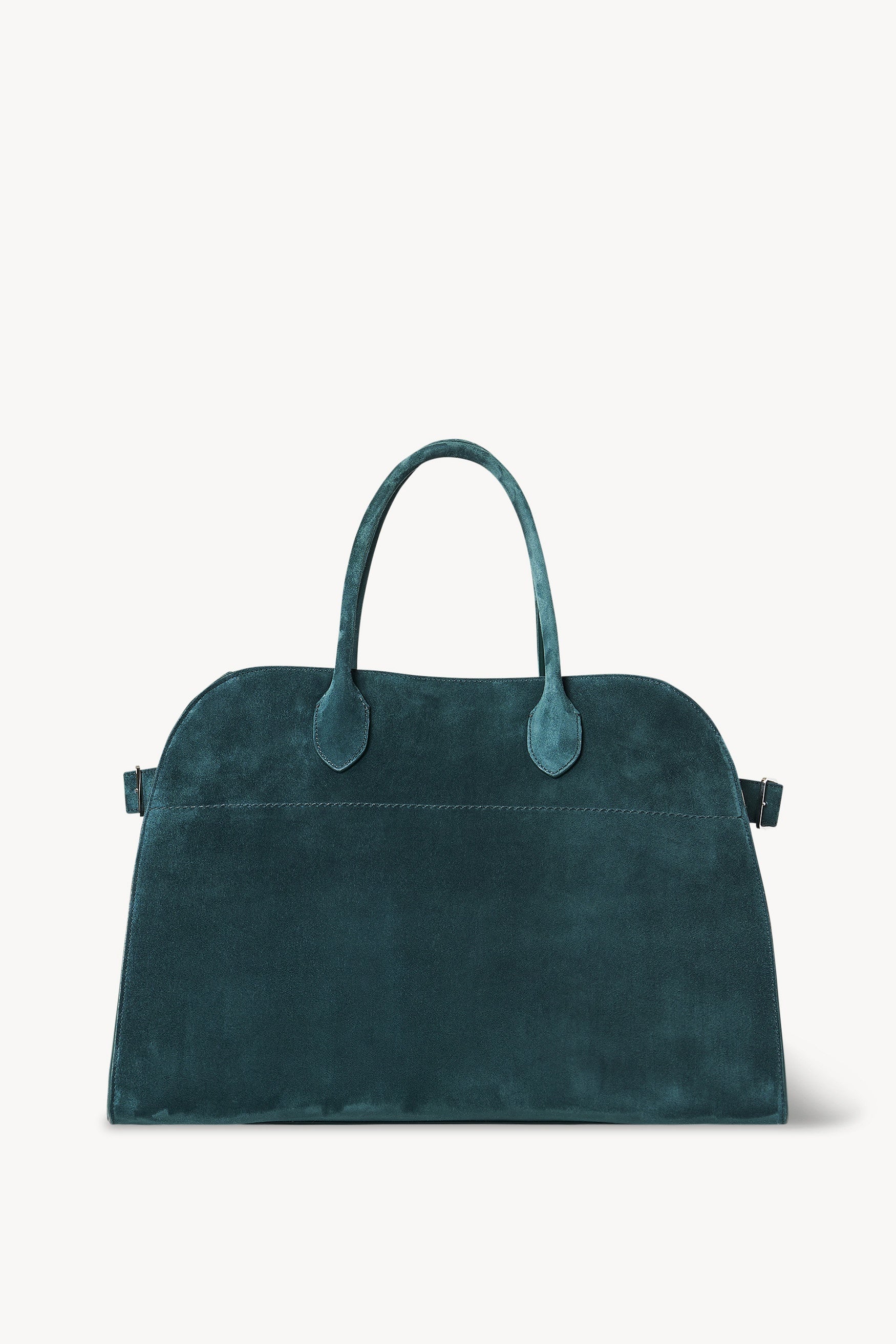 Gracefully structured top handle bag from The Row, crafted in soft calfskin suede with belted, gusseted side panels and a sleek interior.