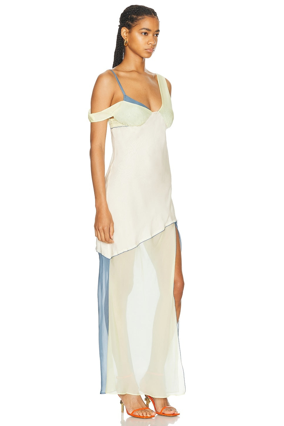 The Thames Splice Midi Dress by SIR features a graceful off-the-shoulder silhouette accented with elegant contrast trim. Crafted from lightweight chiffon, it drapes beautifully while the front slit adds a touch of subtle allure. Partially lined for comfortable wear, this dress secures with a discreet side zipper for a refined finish—ideal for sophisticated occasions.
