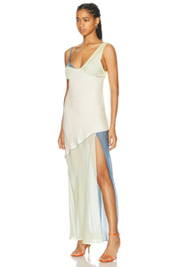 The Thames Splice Midi Dress by SIR features a graceful off-the-shoulder silhouette accented with elegant contrast trim. Crafted from lightweight chiffon, it drapes beautifully while the front slit adds a touch of subtle allure. Partially lined for comfortable wear, this dress secures with a discreet side zipper for a refined finish—ideal for sophisticated occasions.