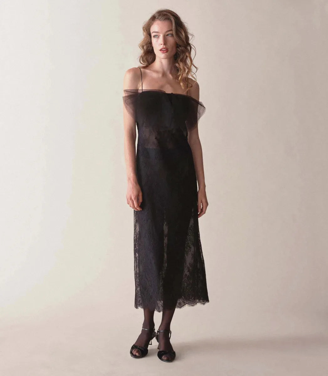 Elevate your special occasion wardrobe with the Aurina Dress by Doen. Made from delicate floral lace, this sheath silhouette features a square neckline with a tulle bow, ultra-skinny spaghetti straps, and invisible side zipper for a sleek finish. With elegant scallop detailing at the midi-length hem, it's perfect for upscale gatherings and evening events.