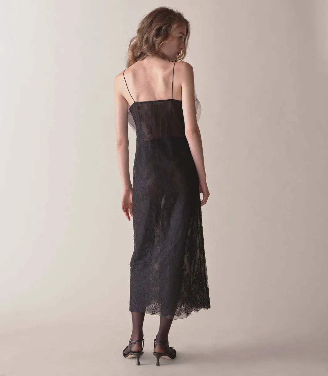 Elevate your special occasion wardrobe with the Aurina Dress by Doen. Made from delicate floral lace, this sheath silhouette features a square neckline with a tulle bow, ultra-skinny spaghetti straps, and invisible side zipper for a sleek finish. With elegant scallop detailing at the midi-length hem, it's perfect for upscale gatherings and evening events.