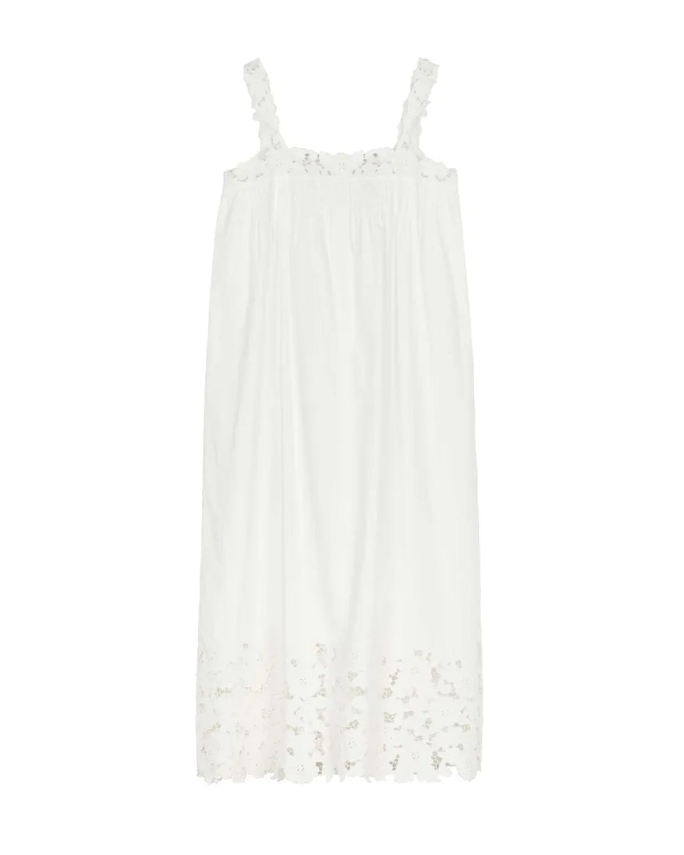Crafted from organic cotton poplin, the Ellen Dress in Salt showcases expert detailing with a square neckline featuring hand-placed floral embroidery cutwork. Thick straps ensure comfort and support, while the ankle-length hem is enhanced by clustered pintucks and shirring, adding subtle texture. This breathable maxi dress combines refined elegance with effortless wearability, making it an excellent choice for warm-weather occasions that call for both style and comfort.