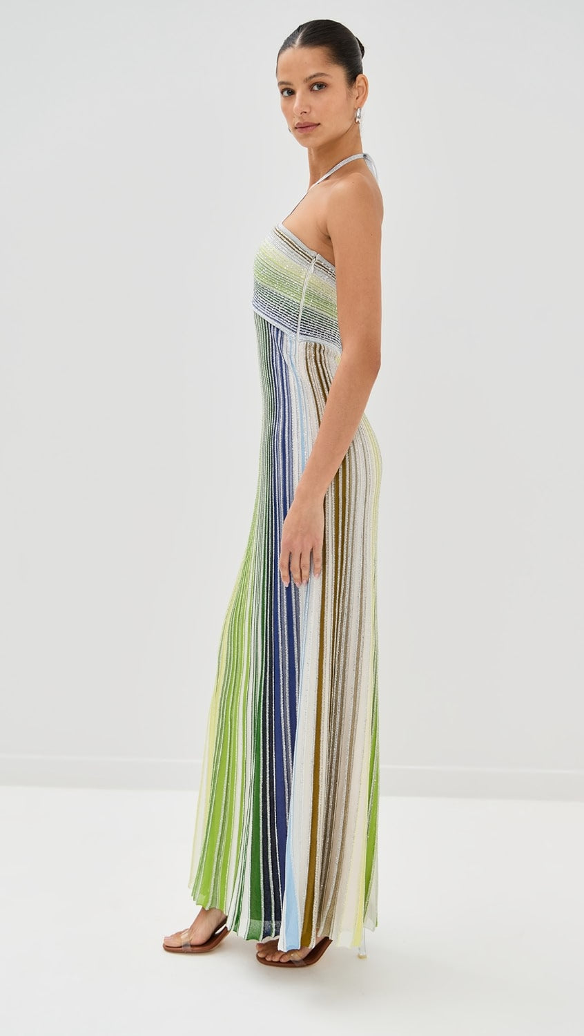Missoni’s Sleeveless Long Dress combines elegant design with comfort, perfect for upcoming seaside events. Made from a soft rayon blend, it ensures lightweight wear while maintaining breathability. The fitted waist enhances your figure, while the flowing skirt adds graceful movement, creating a refined silhouette that elevates your presence effortlessly. This dress is a smart addition to your wardrobe, balancing stylish appeal with ease.
