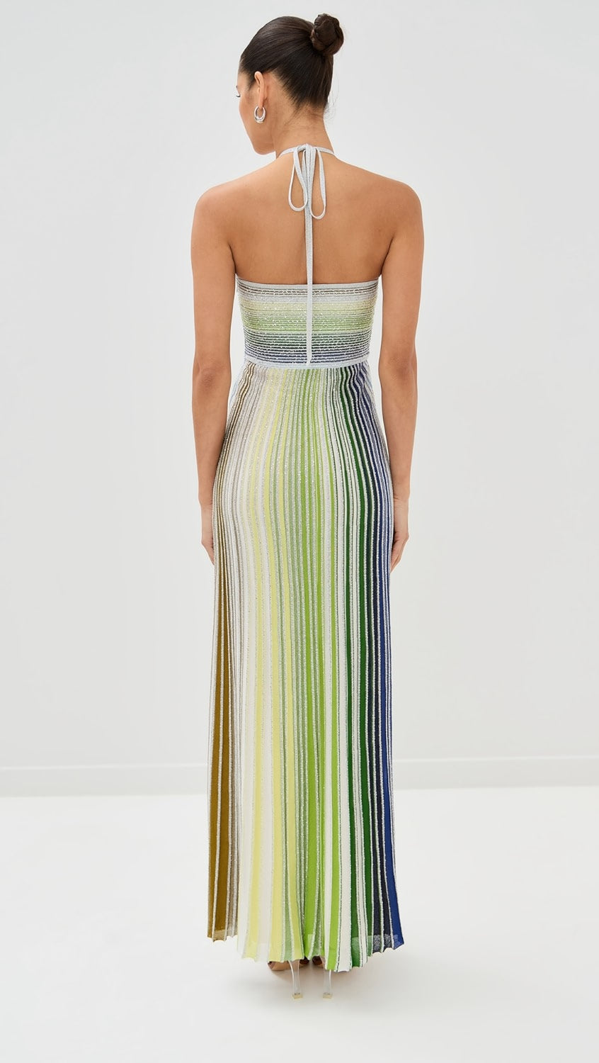 Missoni’s Sleeveless Long Dress combines elegant design with comfort, perfect for upcoming seaside events. Made from a soft rayon blend, it ensures lightweight wear while maintaining breathability. The fitted waist enhances your figure, while the flowing skirt adds graceful movement, creating a refined silhouette that elevates your presence effortlessly. This dress is a smart addition to your wardrobe, balancing stylish appeal with ease.