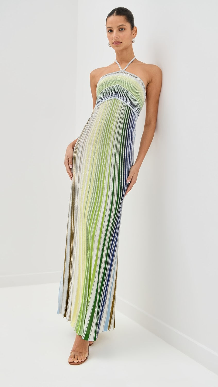 Missoni’s Sleeveless Long Dress combines elegant design with comfort, perfect for upcoming seaside events. Made from a soft rayon blend, it ensures lightweight wear while maintaining breathability. The fitted waist enhances your figure, while the flowing skirt adds graceful movement, creating a refined silhouette that elevates your presence effortlessly. This dress is a smart addition to your wardrobe, balancing stylish appeal with ease.