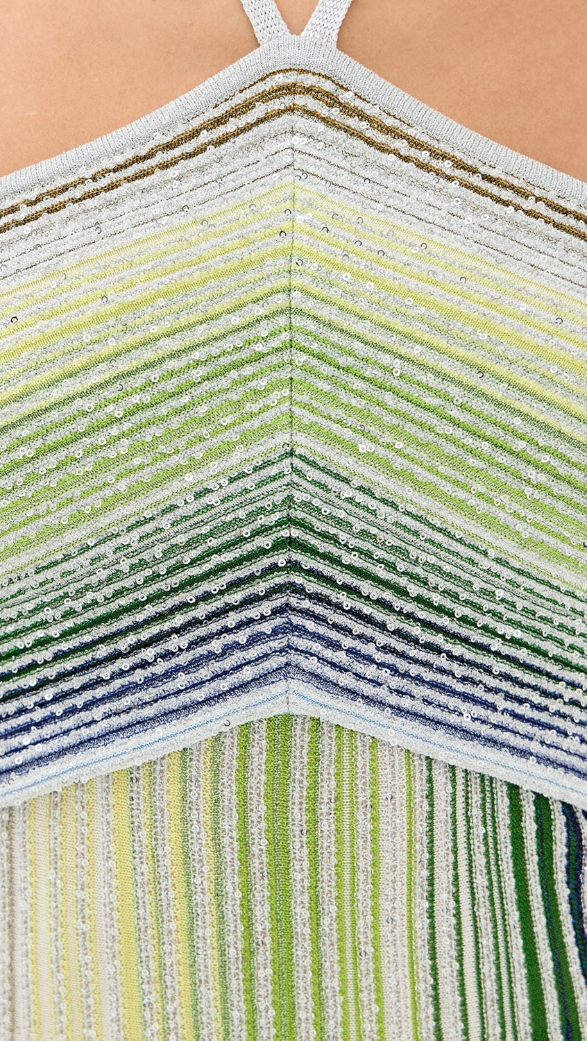 Missoni’s Sleeveless Long Dress combines elegant design with comfort, perfect for upcoming seaside events. Made from a soft rayon blend, it ensures lightweight wear while maintaining breathability. The fitted waist enhances your figure, while the flowing skirt adds graceful movement, creating a refined silhouette that elevates your presence effortlessly. This dress is a smart addition to your wardrobe, balancing stylish appeal with ease.