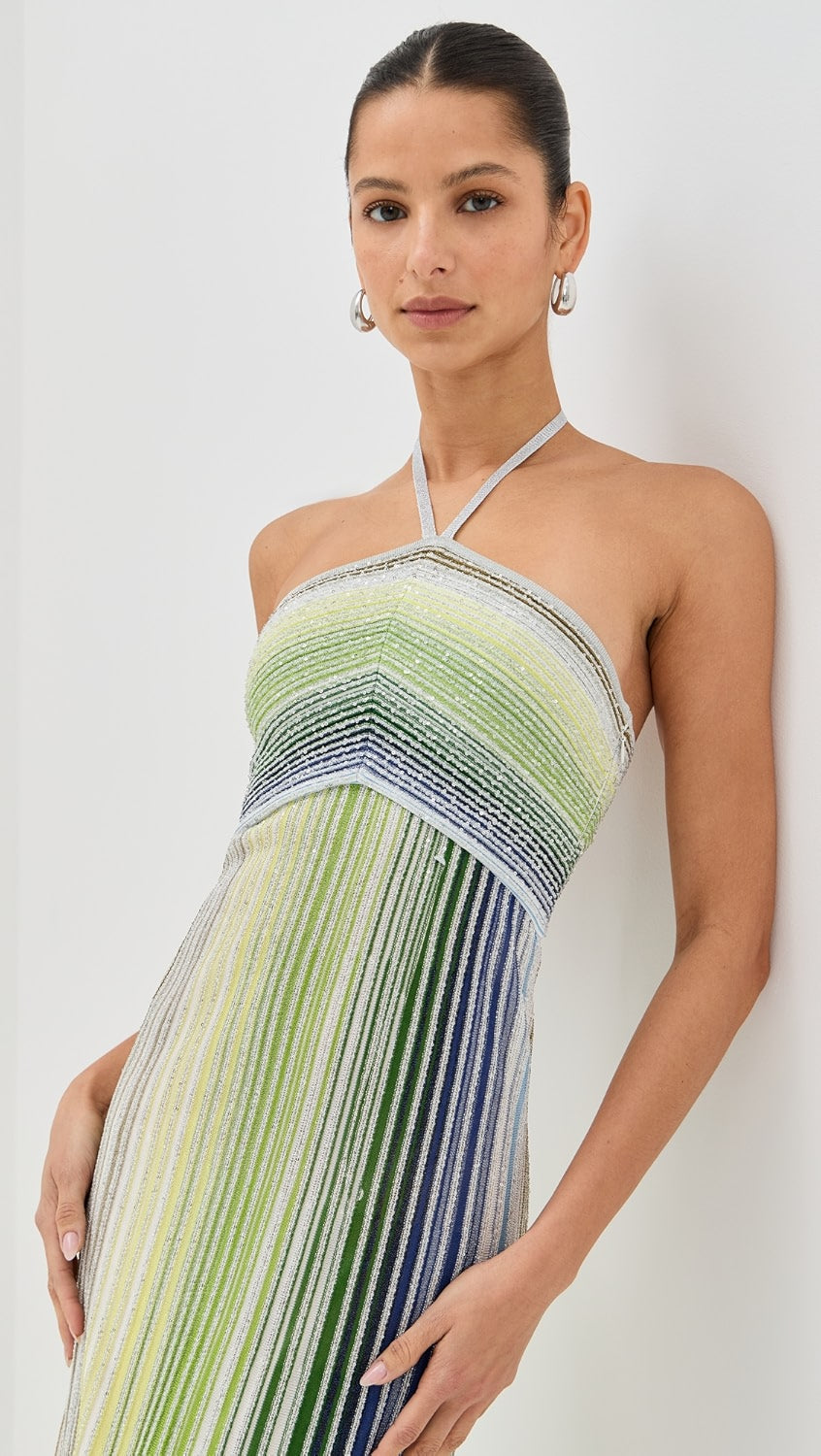 Missoni’s Sleeveless Long Dress combines elegant design with comfort, perfect for upcoming seaside events. Made from a soft rayon blend, it ensures lightweight wear while maintaining breathability. The fitted waist enhances your figure, while the flowing skirt adds graceful movement, creating a refined silhouette that elevates your presence effortlessly. This dress is a smart addition to your wardrobe, balancing stylish appeal with ease.