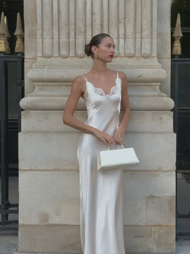 Elegant Daisy dress featuring a deep V-neckline and adjustable straps for a perfect fit. Delicate lace cups add sophistication and femininity, while the classic silhouette ensures comfortable all-day wear. This piece requires gentle care—hand wash only to preserve the fabric quality and extend its lifespan.