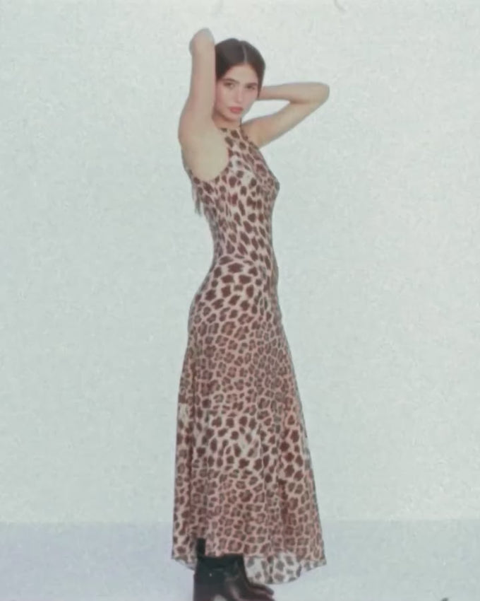 Slip into understated elegance with The Romy, a bias-cut midi dress designed for fluid movement and timeless appeal. The high neckline and gracefully draped skirt create a sophisticated silhouette, while the sculpted back and refined V-shaped hip detailing add subtle dimension. Fully lined and effortlessly slip-on, this versatile piece transitions seamlessly from day to evening. A wardrobe staple that rewards you with endless styling possibilities.