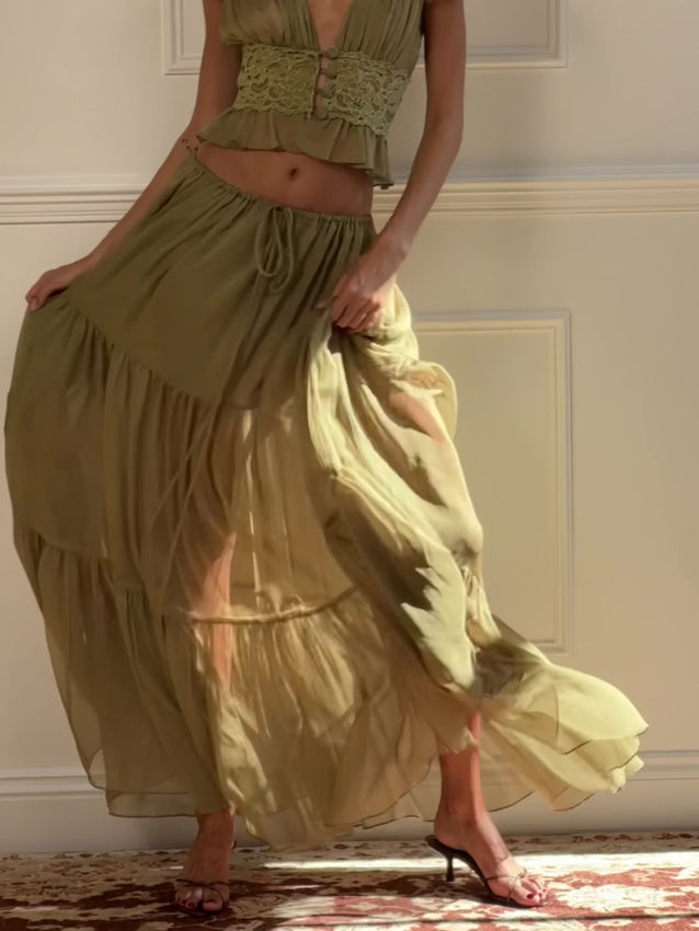 The Sabrina skirt epitomizes effortless elegance in a soft pistachio chiffon. Cut on the bias, this floor-length design features a graceful tiered silhouette that moves with every step. An adjustable drawcord waistband sits at the low to mid waist for a customizable fit. Crafted with meticulous attention to detail, French seams and fully bound interior finishes ensure refined construction throughout. The lightweight, semi-sheer fabric drapes beautifully—pair with neutral underwear or a slip.