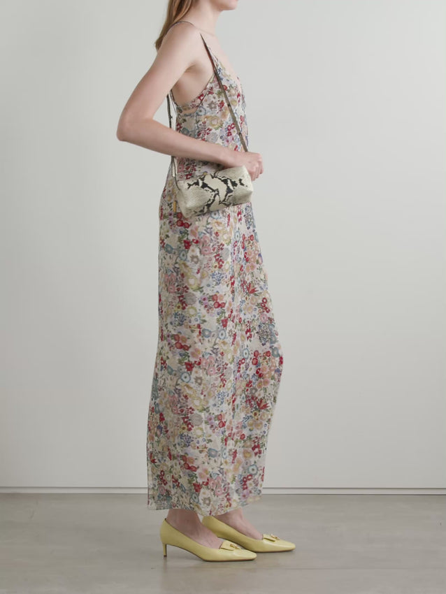 Elevate your wardrobe with the Taja floral-print silk-chiffon dress by KHAITE. This ethereal piece features a delicate floral print rendered on luxurious silk-chiffon fabric, creating an effortlessly romantic silhouette. The lightweight, breathable material drapes beautifully against the skin, making it perfect for warm-weather occasions, garden parties, or sophisticated evening events. The fluid construction ensures graceful movement while maintaining an elegant, refined aesthetic. 
