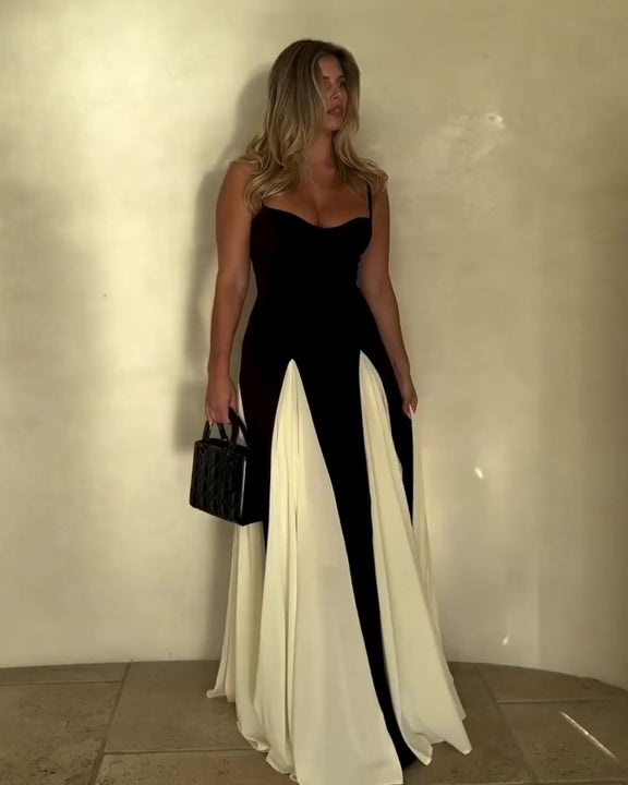 Introducing Paloma, a captivating blend of timeless elegance and contemporary flair. Featuring a striking panelled A-line skirt that sits effortlessly off the hips and flares lightly with cream georgette. Contrasted accents provide captivating fluidity in movement, ensuring a mesmerising presence at any event. Complete with padded bra cups and binded edges for added lift and support. Paloma exudes sophistication from every angle.